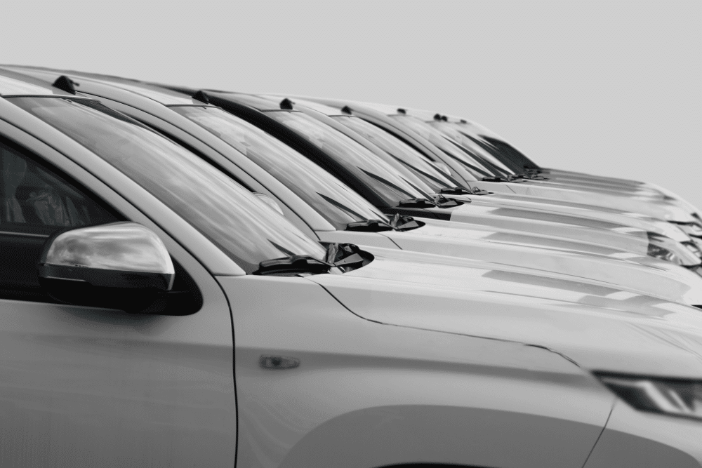 fleet maintenance, auto repair in Lansing, MI at Jerry's Automotive. Fleet of white SUVs parked in a row.